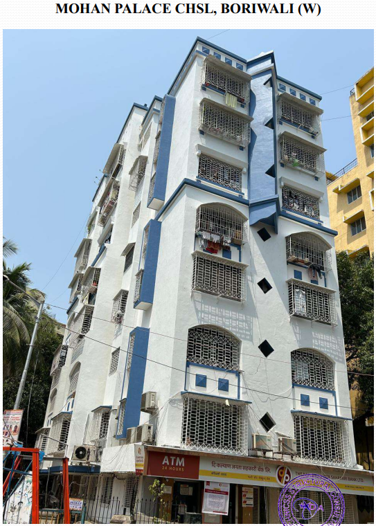 Multi-story residential building named Mohan Palace CHSL in Boriwali West with blue and white exterior and an ATM on the ground floor.